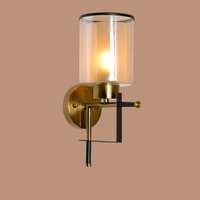 Gold & Black Frame Wall Light with Amber Glass Shade