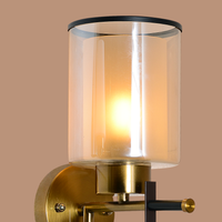 Gold & Black Frame Wall Light with Amber Glass Shade