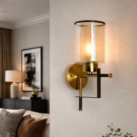 Gold & Black Frame Wall Light with Amber Glass Shade
