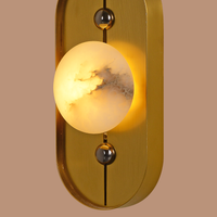 The Alabaster Eclipse Wall Light
