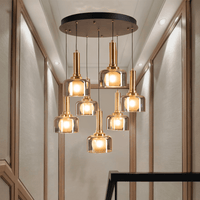 Globes of Gold Hanging Light - Teenbatti